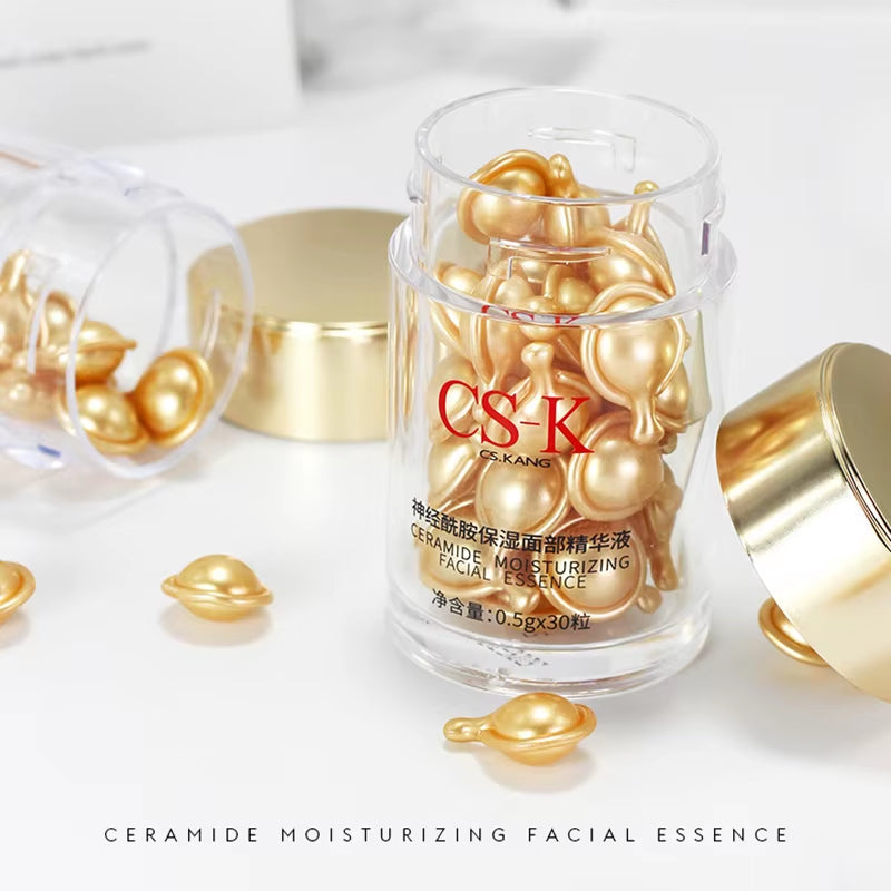 Ceramide Face Capsule Serum in clear jar with glossy gold capsules, featuring a moisturizing facial essence formula