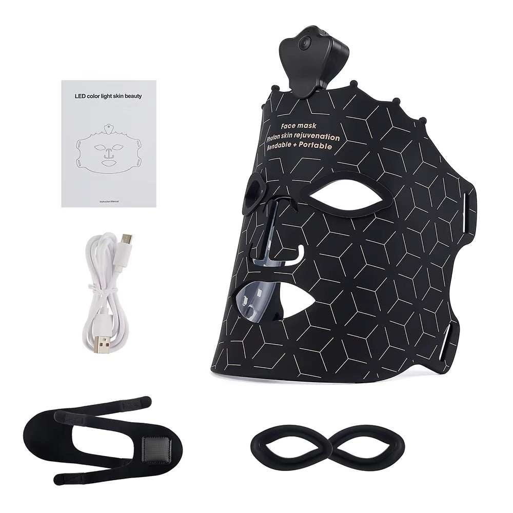LED Silicone Facial Mask in black silicone with geometric line pattern, eye and mouth cutouts, and adjustable straps