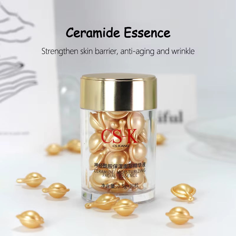Ceramide Face Capsule Serum in a clear jar with golden capsules and metallic gold lid, moisturizing essence formula