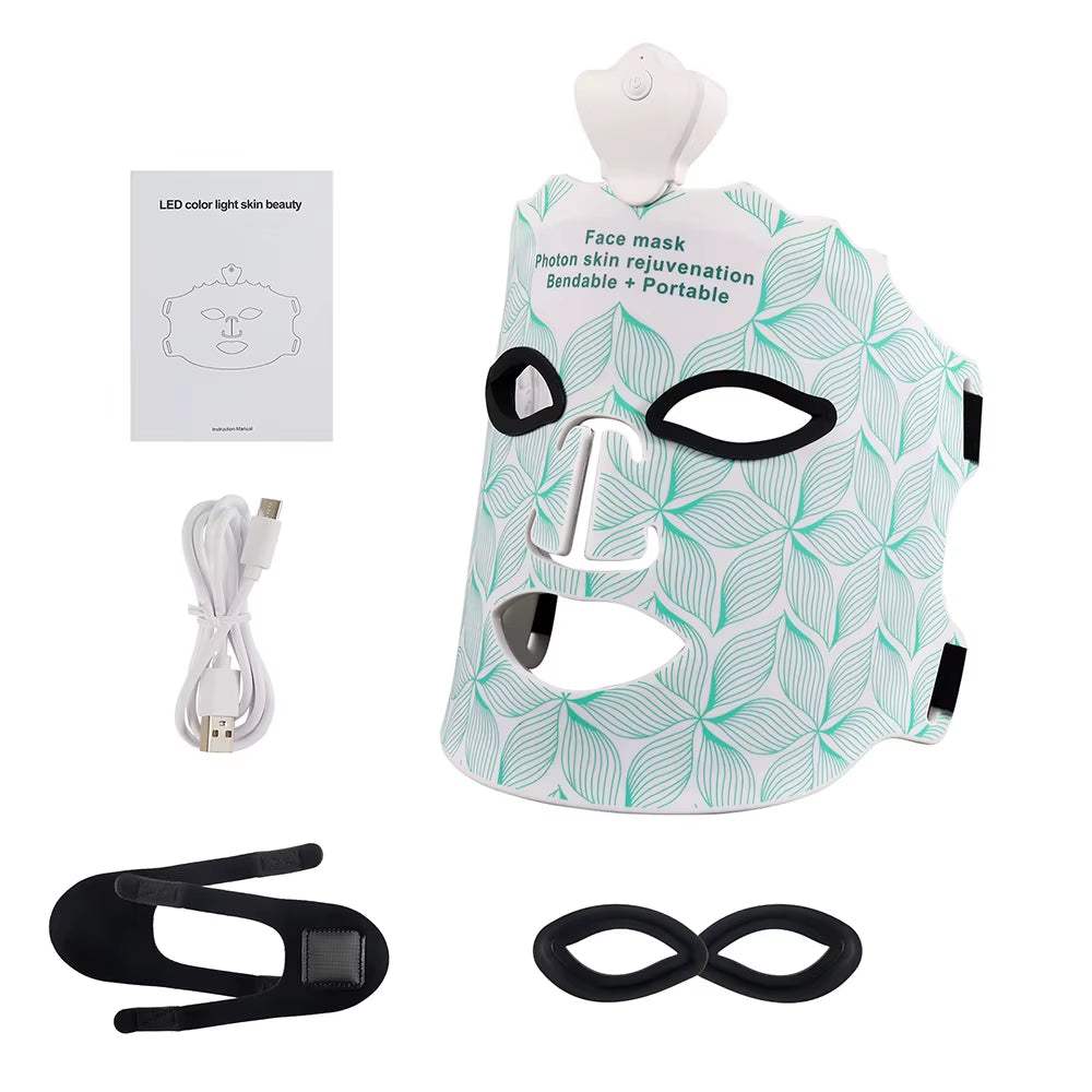 LED Silicone Facial Mask in white and teal leaf-patterned silicone, with eye openings, straps and USB cable