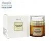 PDRN Peptide Face Serum in a small amber glass jar with a white screw lid and matching box packaging