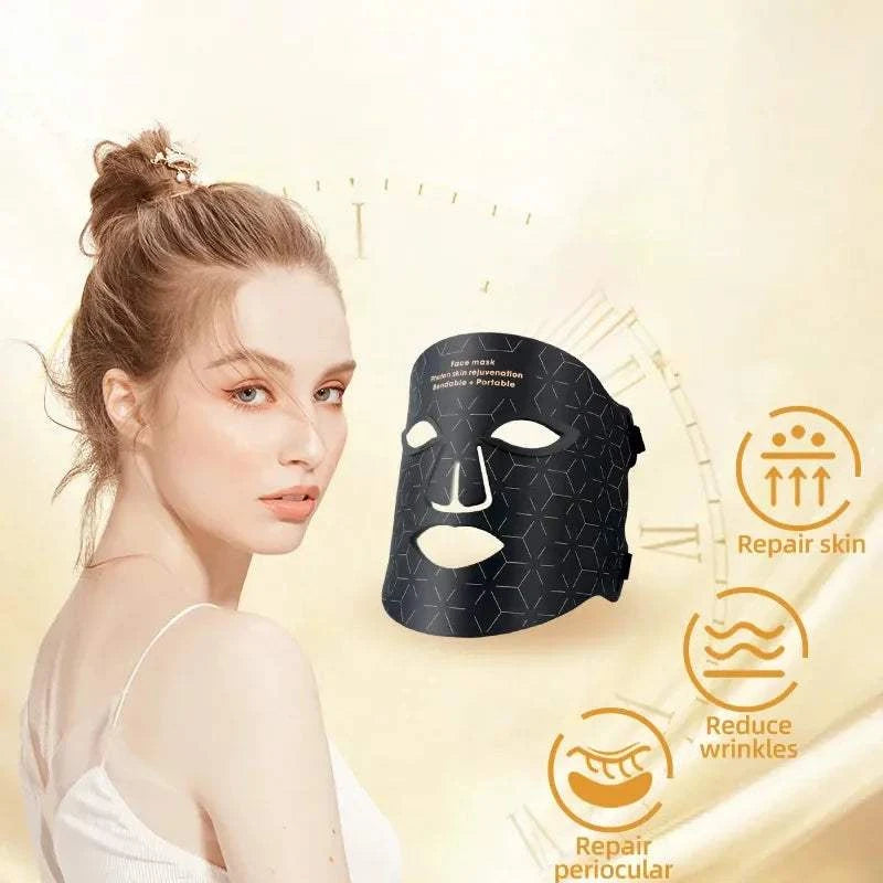 LED Light Therapy Facial Mask, black silicone design with geometric pattern and eye, nose, and mouth openings