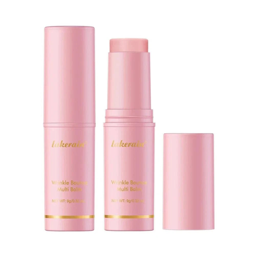 Wrinkle Bounce Multi Balm Stick in a pink cylindrical tube, shown with its cap removed and balm extended