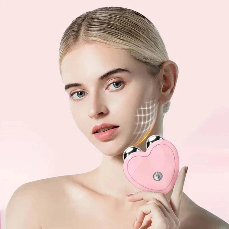 Micro Current Facial Device, pink heart-shaped roller with twin metal massage balls for facial contouring and lifting support