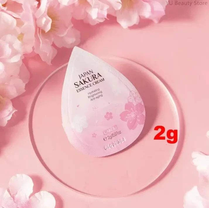 Glow & Lifted Collagen Jelly Cream, pink sakura essence cream sachet with floral pattern and 2g size marker