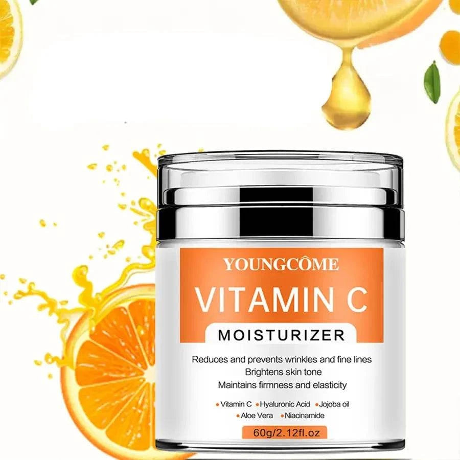 Vitamin C Face Cream in a clear jar with orange label, silver lid, and moisturising cream formula
