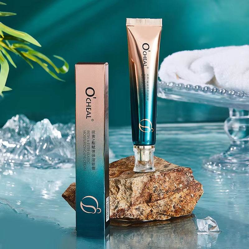 Moisturizing Eye Cream in a metallic rose-gold and teal tube with matching gradient box packaging