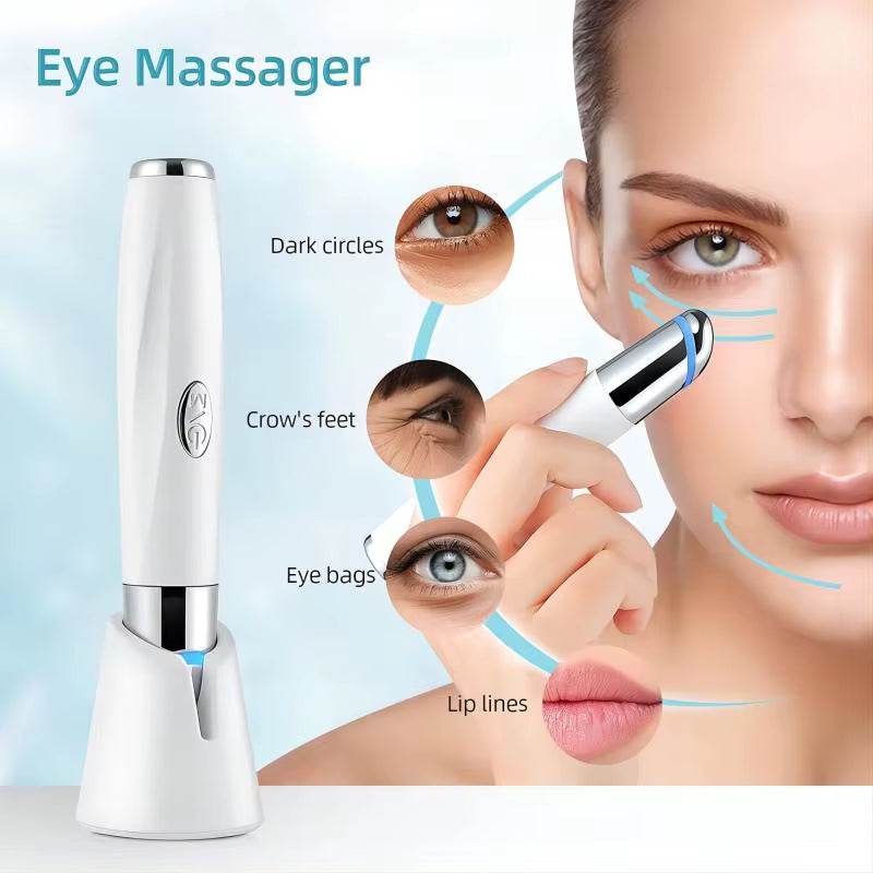 Eye Care Beauty Device, white handheld facial massager with metallic tip and oval control button for eye care