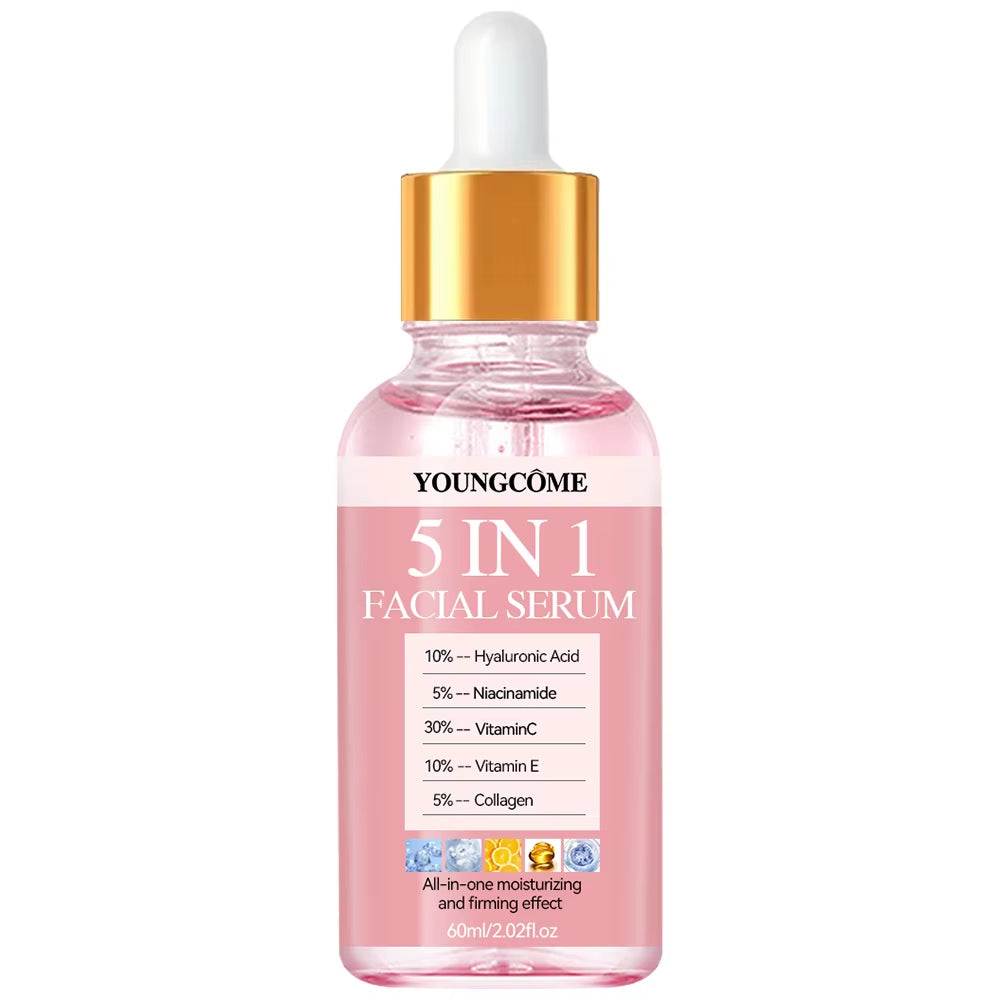 Facial serum in a clear pink glass dropper bottle with gold cap, featuring Vitamin C Hyaluronic Acid formula and 5-in-1 label