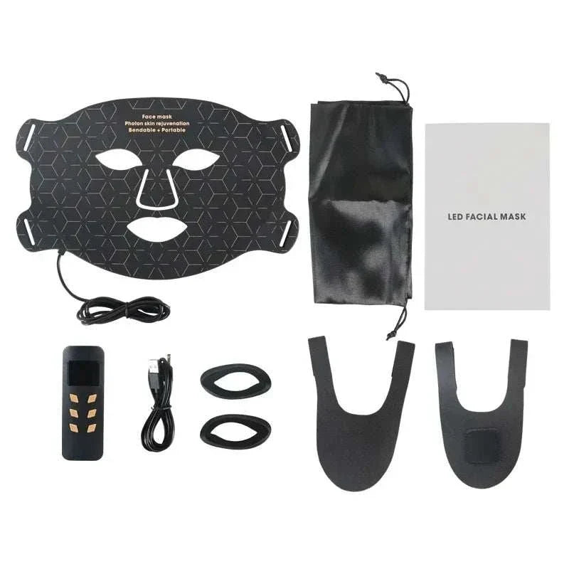 Home Use Therapy Face Device black LED facial mask with geometric pattern, remote control, USB cable, straps, and pouch