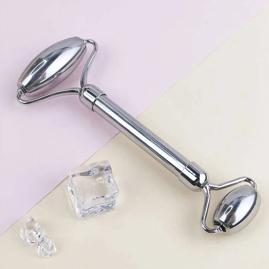 Ice facial roller set in polished stainless steel, featuring dual cooling rollers for facial massage and skincare care