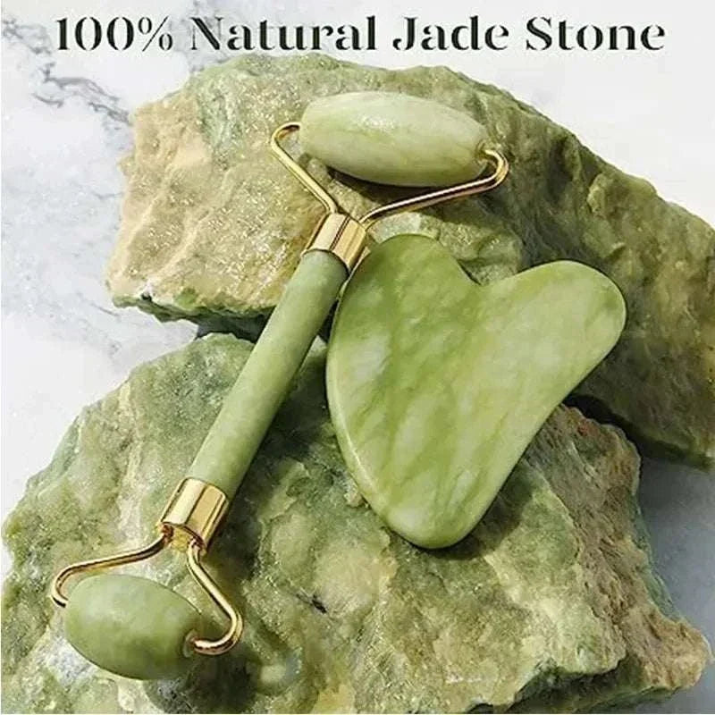 Natural Xiuyan Jade facial massage set in pale green stone, featuring a double-ended roller and heart-shaped gua sha tool
