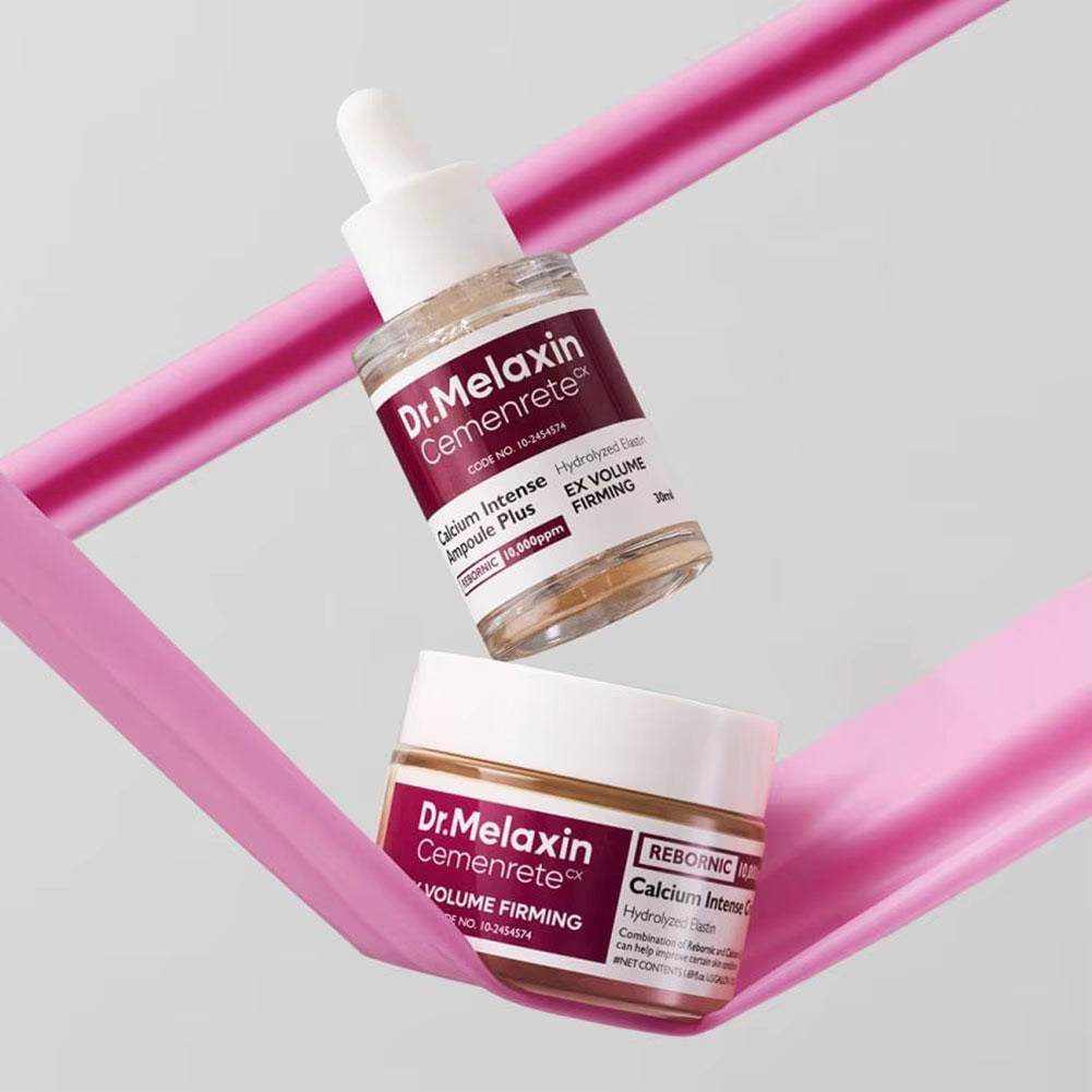 Calcium Intense Ampoule Firming Cream set with a clear dropper bottle and white-lidded jar, both labeled Dr. Melaxin