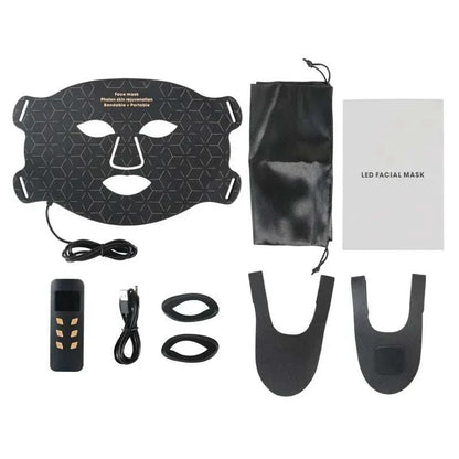 Home Use Therapy Face Device black LED facial mask with geometric pattern, remote control, USB cable, straps, and pouch