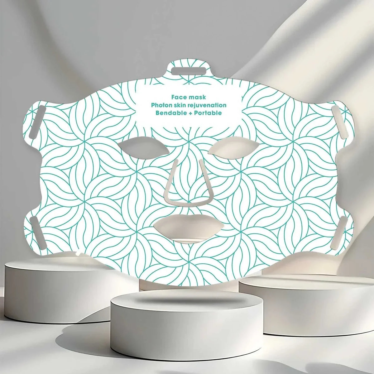 Infrared Light Therapy face mask with teal geometric pattern, bendable and portable design for photon skin rejuvenation