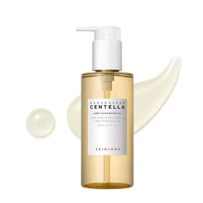 Light cleansing oil in a transparent amber plastic bottle with white pump, part of Korean SKIN1004 Skincare line for gentle pore care