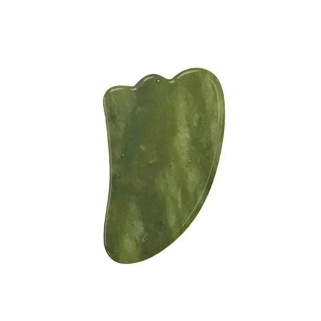 Gua sha facial massage tool in mottled dark green Natural Xiuyan Jade with a smooth, curved scraping edge