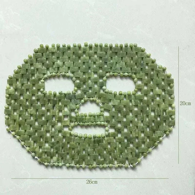 Natural Xiuyan Jade facial mask made of woven green stone pieces, with eye and mouth openings and beaded edges