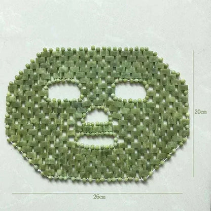 Natural Xiuyan Jade facial mask made of woven green stone pieces, with eye and mouth openings and beaded edges