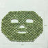 Natural Xiuyan Jade facial mask made of woven green stone pieces, with eye and mouth openings and beaded edges