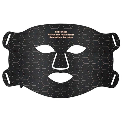 black silicone face mask for Red Light Photon Therapy with geometric pattern and cutouts for eyes, nose, and mouth
