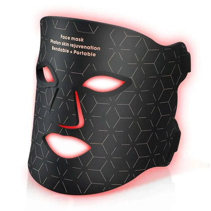 Black silicone LED face mask with geometric pattern and glowing red light edges for Red Light Photon Therapy skincare